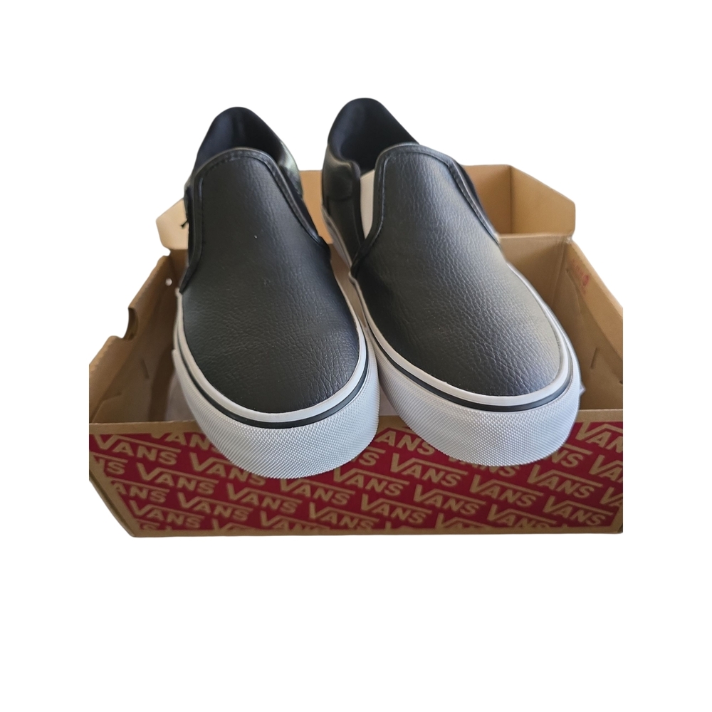 Vans Black and White Classic Slip-On Sneakers